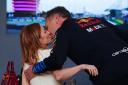 Christian and Geri Horner kiss before the Bahrain Grand Prix