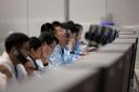 Technical personnel work at the Beijing Aerospace Control Centre in Beijing on Sunday (Xinhua News Agency/AP)