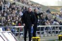 A grim-faced Michael Appleton watches United's defeat by Orient