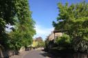 Beauchamp Lane in Cowley pictured in spring sunshine last week
