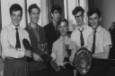 Memory Lane Feb 27.Downpage -one picture.THIS team knew all about telephones and ,judging by the trophies they are holding, were skilful table tennis players too..Members of the the Oxford Telephone Service sports and social club were celebrating a succes