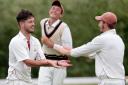 Banbury seamer Graham Beer is congratulated after dismissing Thame's Gamindu Kanishka during his side's decisive victory Picture: Ric Mellis