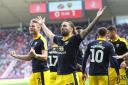 Ricky Holmes salutes the Oxford United travelling support after opening the scoring against Sunderland  Picture: Richard Parkes