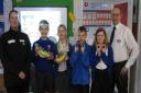 Midcounties Co-op colleagues with pupils at St Andrew's Church of England Primary School, for a Fairtrade awareness visit