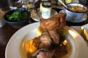 SUNDAY LUNCH: Roast beef at The Thatch pub in Thame, with a dish of greens at one side and cauliflower cheese at the other. Inset: the outside of the pub