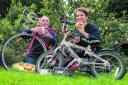 Geoff Raynham and Abi Johnson are planning bike maintenance classes and raising money from apple pressing for the village hall in Sandford