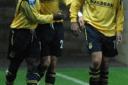 Yemi is congratulated after scoring the U's third goal