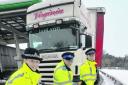 Left to right, Pc Laura Jones, Pcso Larry Gardner and Pc Chris Bennett, who dug 10 lorries out of the snow