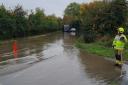 Flooding on the A417 caused emergency services to block access to sections of the road
