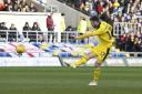 James Henry lets fly with an early shot, but Oxford United could not find a way past Bristol Rovers  Picture: David Fleming