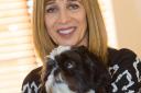 Relationship coach and author Annie Kaszina with her dog Basil