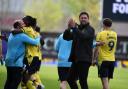 Des Buckingham celebrates at full-time against Peterborough United