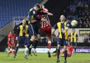 Steve MacLean heads goalwards as Oxford push for a second-half winner