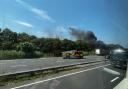 The lorry on fire and the fire service