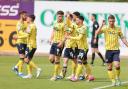 Oxford United celebrate at Exeter City