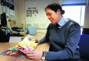 Wing Commander Angela Baker, who reads daily to her two children, in her office in RAF Brize Norton. Picture: Tom Jennings