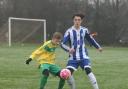 Kennington's Harvey Williams shield the ball from St Edmunds' Ethan Hoskin during their Under 13 KO Cup clash