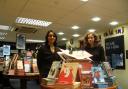 Staff Salma Caller, right, and Natalia de la Ossa are looking forward to the Blackwell's Christmas Family Day
