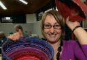 Denise Grayburn with her fabric coiled pot