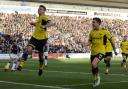 Ryan Ledson celebrates putting Oxford United in front from the penalty spot  Pictures: David Fleming
