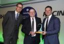 TOP HONOUR: William Reddy (centre) receives his Dedication to Racing award from presenter Ed Chamberlin and Michael Owen Picture: Dan Abraham-focusonracing.com