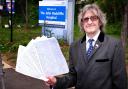 Councillor Mick Haines with the 500-signature petition he's going to present to the hospital management calling for a multi-storey car park to be built at the JR.Picture: Ric Mellis.17/5/2019.