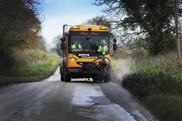 Oxford Mail: Oxfordshire County Council's pothole repair team. Picture by Jon Lewis