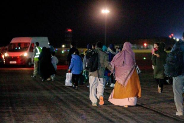 British nationals and Afghan refugees arrive at Brize Norton Picture: PA