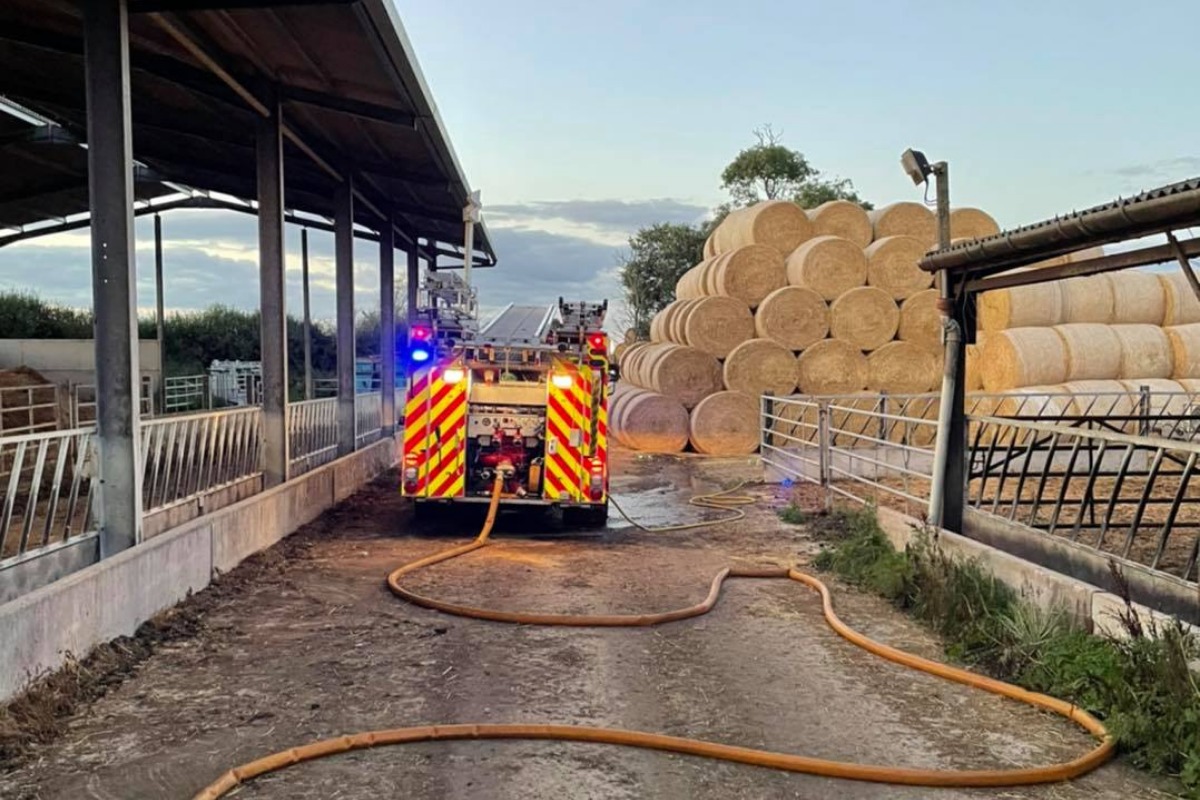 Firefighters tackle the hay fire in Poundon, near Bicester Pictures: OFRS