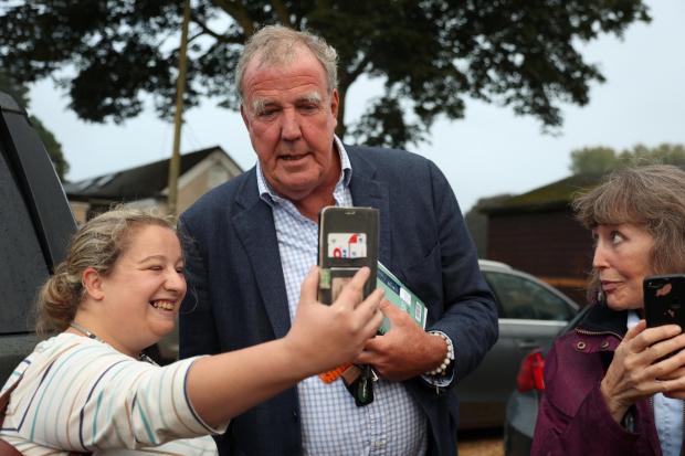 Oxford Mail: Jeremy Clarkson arrives at the Memorial Hall meeting called to discuss his farm shop, September 9 2021