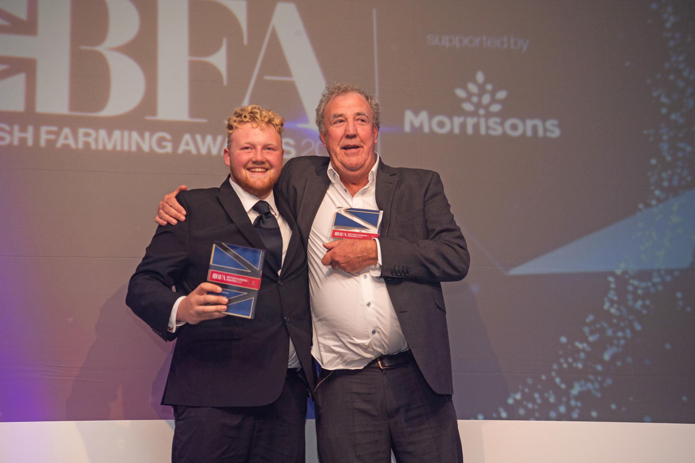 Kaleb Cooper (left) and Jeremy Clarkson after he won the he won the flying the flag for British agriculture award at the British Farming Awards in Birmingham.Picture: Amazon Prime Video Clarksons Farm/PA Wire