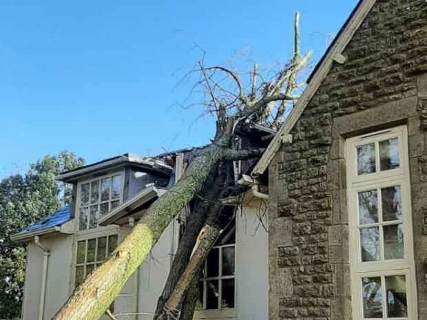Oxford Mail: Bicester house after tree fall. Picture: Oxfordshire Fire and Rescue 