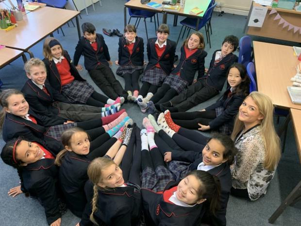 Oxford Mail: Rye St Antony pupils wearing their odd socks to mark Anti-Bullying Week. Picture provided by the school