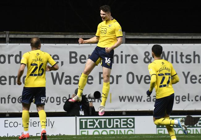 Luke McNally celebrates his first goal in English football Picture: David Fleming