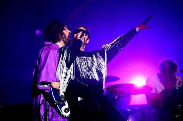 Oxford Mail: Isle of Wight Festival 2018 - Friday - Main Stage - Kasabian, left, Sergio Pizzorno with Tom Meighan..