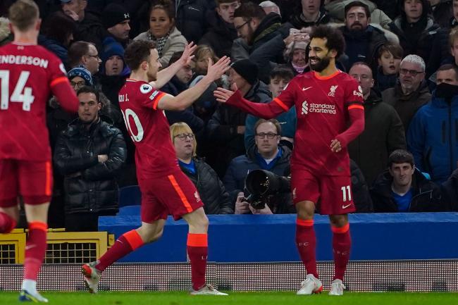 Mohamed Salah (right) celebrates for Liverpool