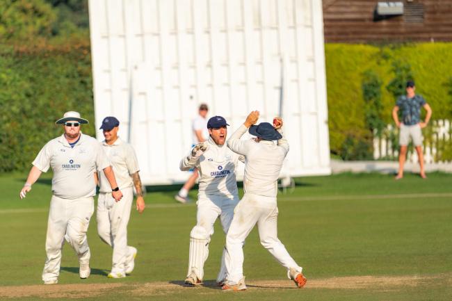 Oxfordshire captain Jonny Cater (second from right) congratulates George Tait. Picture: Thom Airs