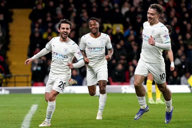 Bernardo Silva (left) celebrates after scoring his second goal in Manchester City's 3-1 win at Watford