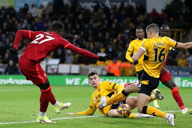 Divock Origi scores Liverpool's injury-time winner at Wolves