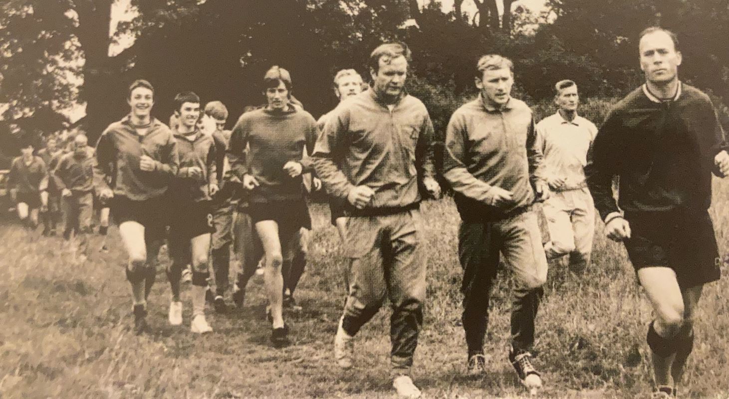 Ron Saunders leads Oxford United players on a run through Shotover in 1969