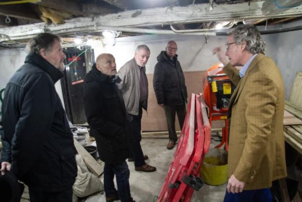 Oxford Mail: Members of Oxford CAMRA look at the pub's old cellar Photo: Phil Gammon 