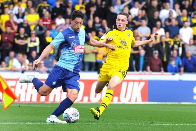 Gavin Whyte closes down Joe Jacobson on Oxford United's last trip to Wycombe Wanderers Picture: Jon Lewis