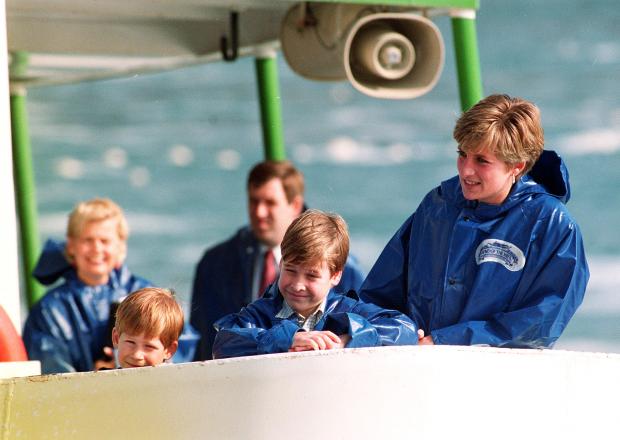 Oxford Mail: Photo via PA dated 26/10/91 of Diana, Princess of Wales with her children, then Prince William, 9, and then Prince Harry, 7, on board the Maid of Mist for a close-up look at Niagara Falls. 