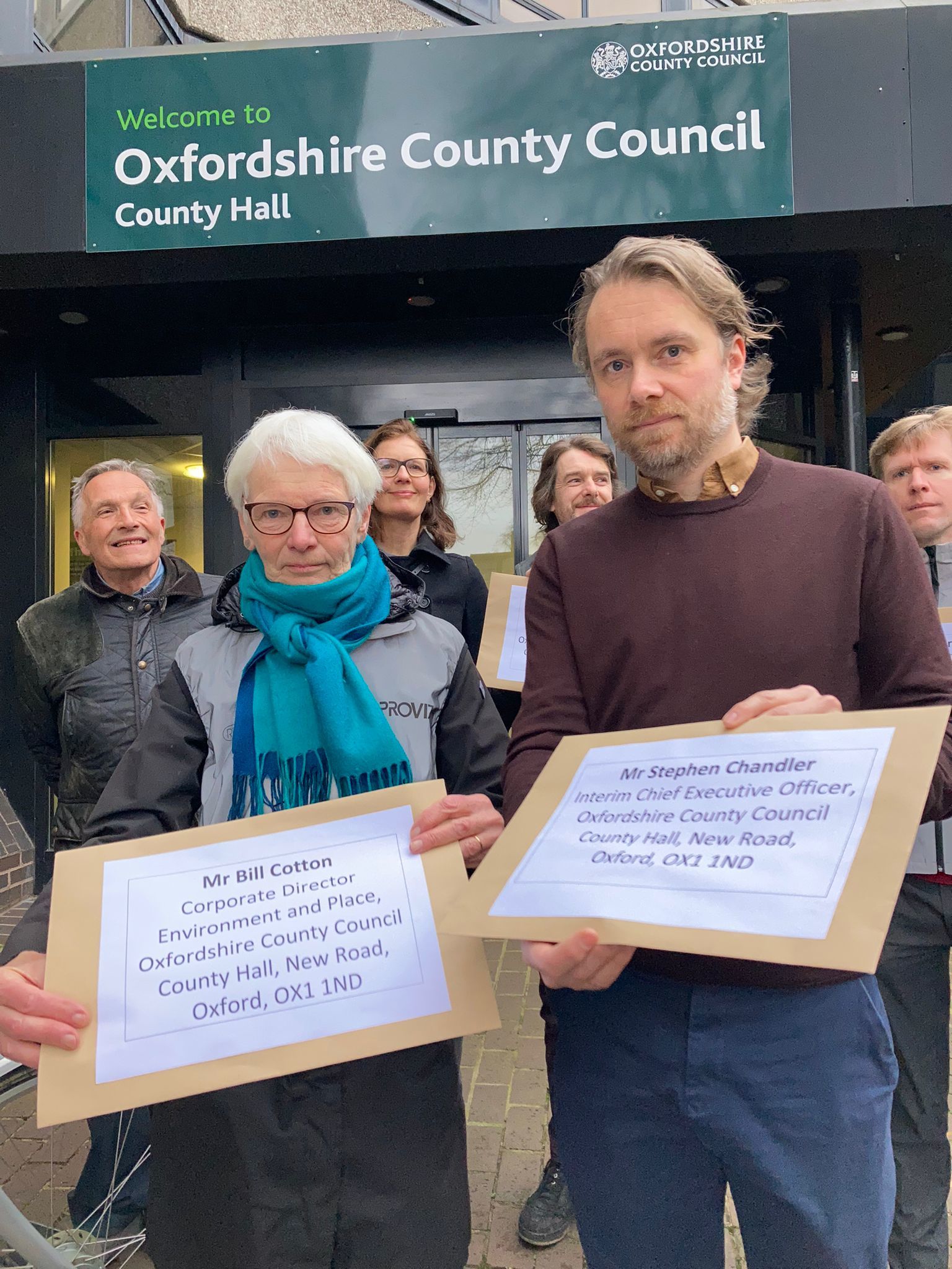 Dr Alison Hill and Mark Fransham outside County Hall with their letters calling for improvements to Kidlington road where female cyclist died