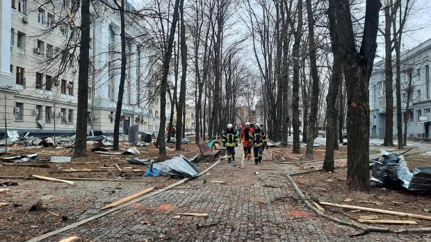 Oxford Mail: Firefighters survey the devastation caused by a missile strike in Kharkiv. Picture: PA