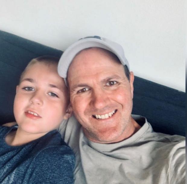 Oxford Mail: Brett Parson with his son Bradley