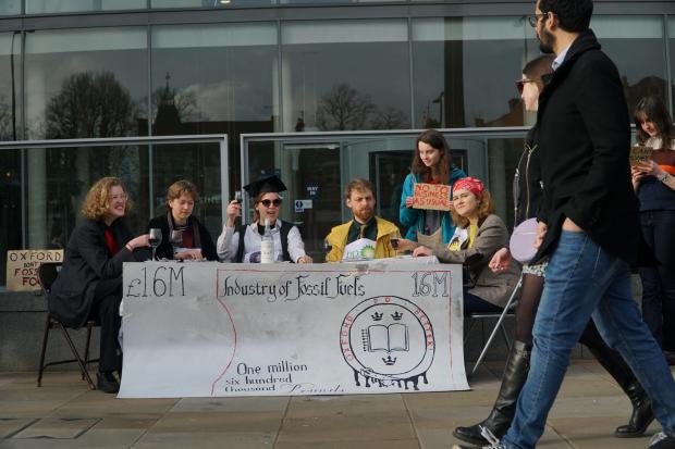 Oxford Mail: Students demonstrate against Oxford University accepting £1.6 million from fossil fuel companies.