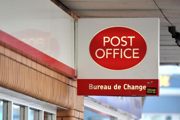 Oxford Mail: File image of a post office sign. Picture: PA Media 