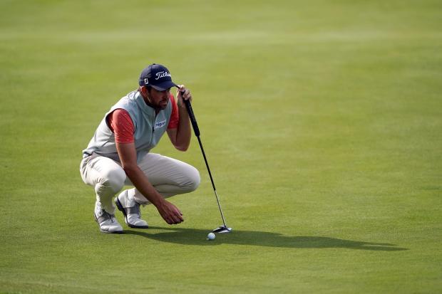 Eddie Pepperell lines up a putt at the Betfred British Masters Picture: Zac Goodwin/PA Wire