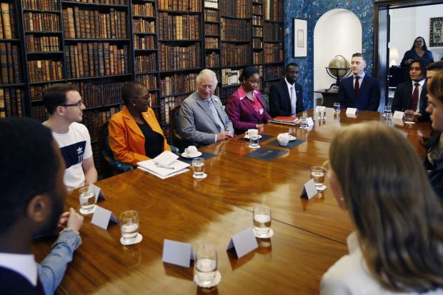 Oxford Mail: Prince Charles holds discussion with students at University College. Photo by Ed Nix 